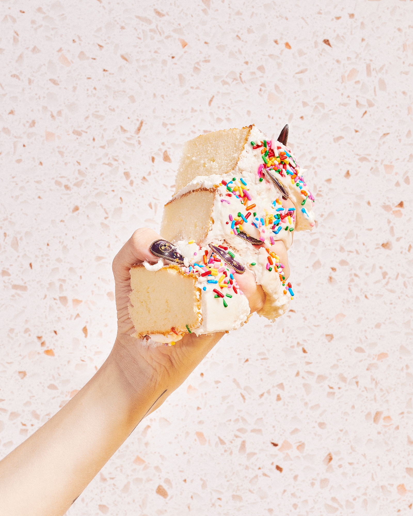 smashed-cake-slice-in-hand